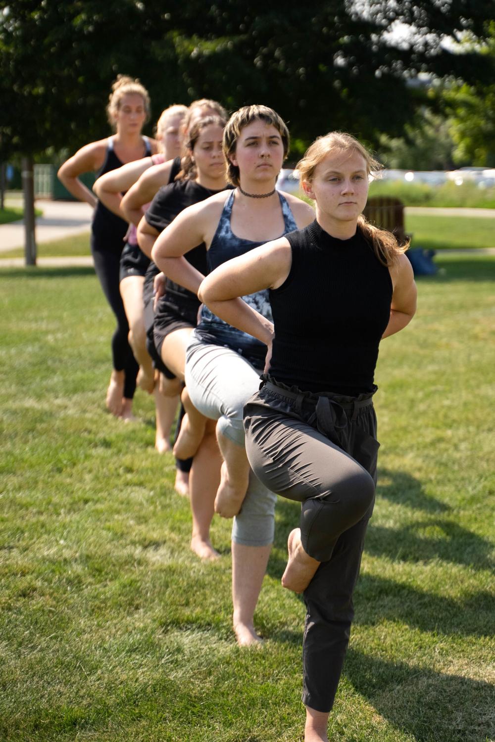 Students dance outside. 