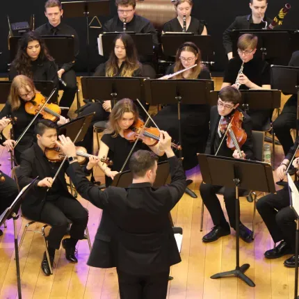 Gustavus Symphony Orchestra performing in the Derry Guildhall, Ireland