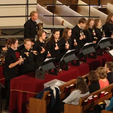 Gustavus Handbell ensemble performing in Christ Chapel.