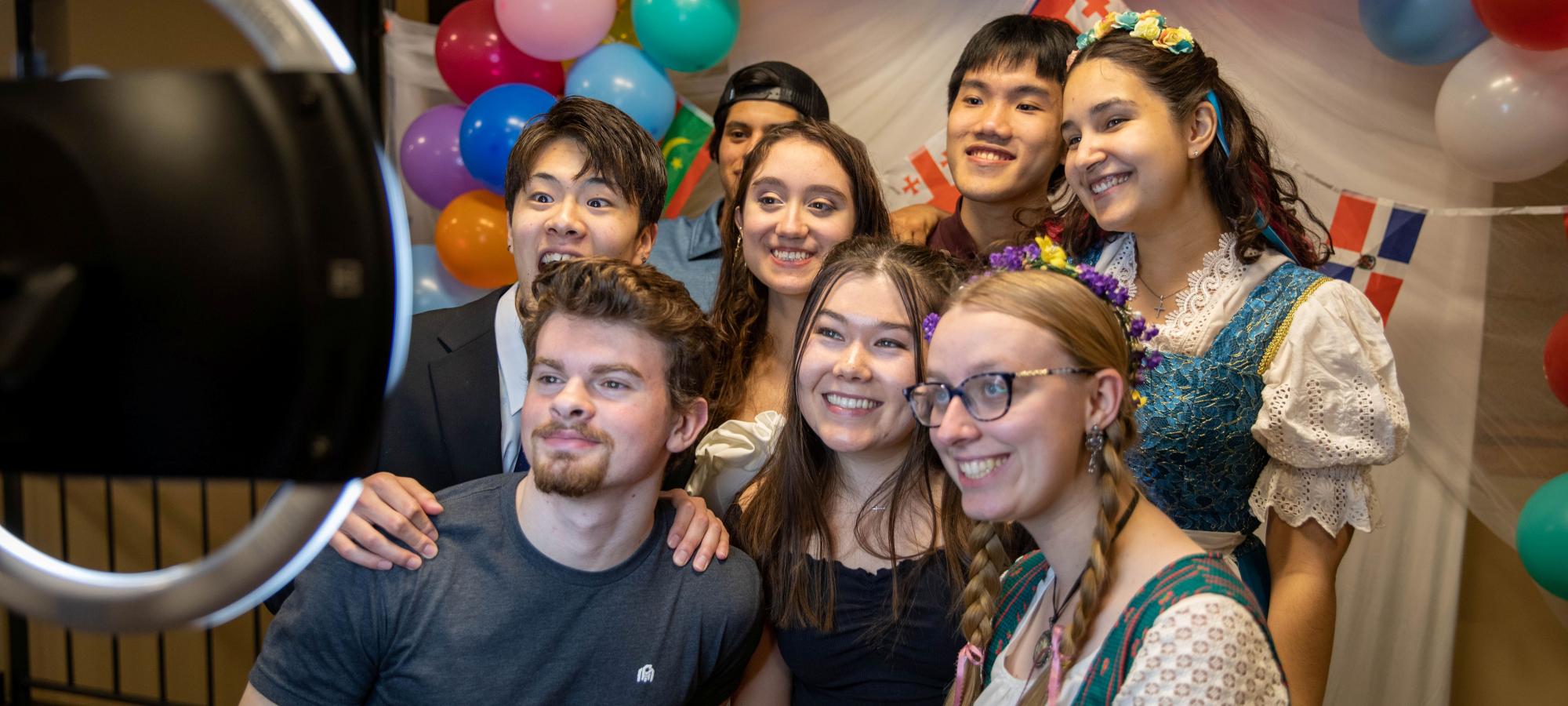 Students taking a photo at International Festival