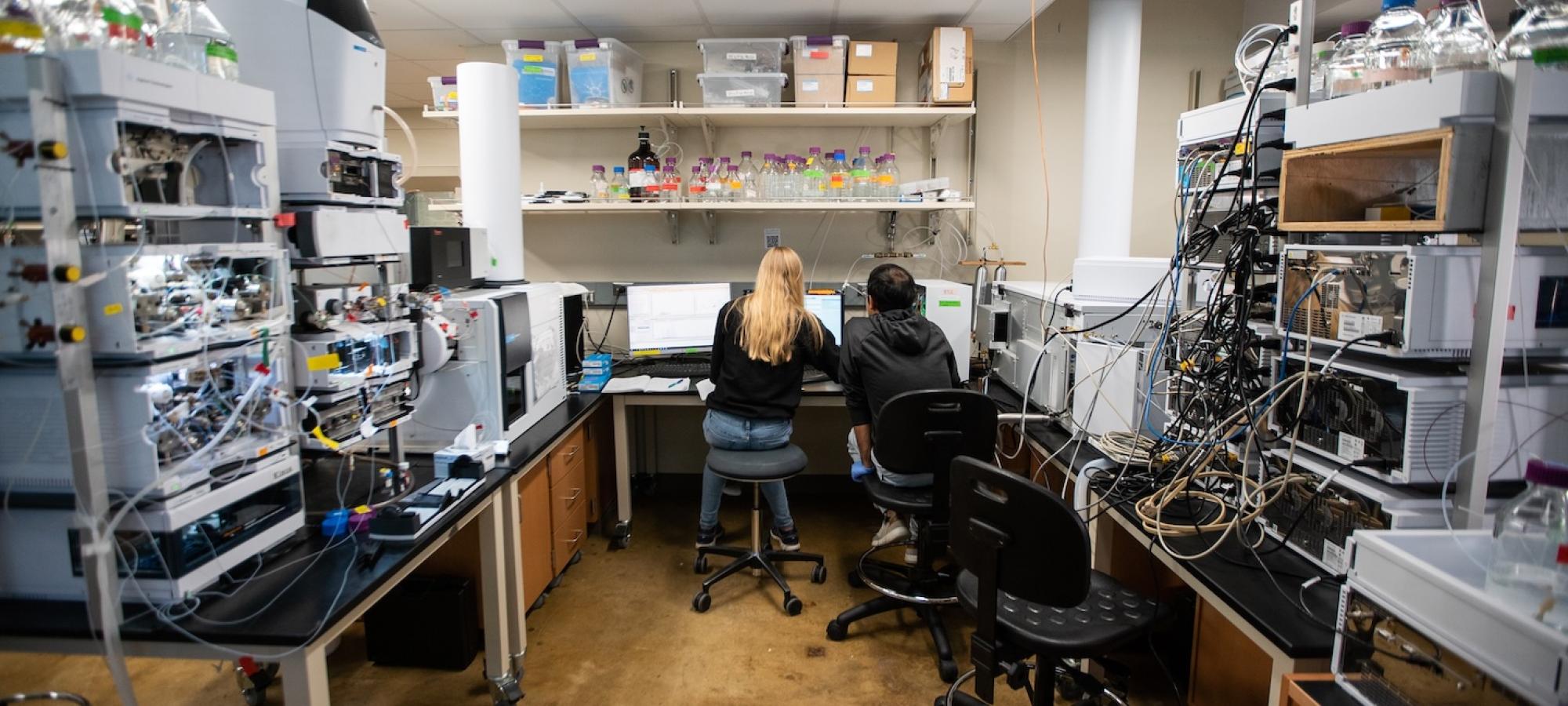 Two students work together in a robust science lab.