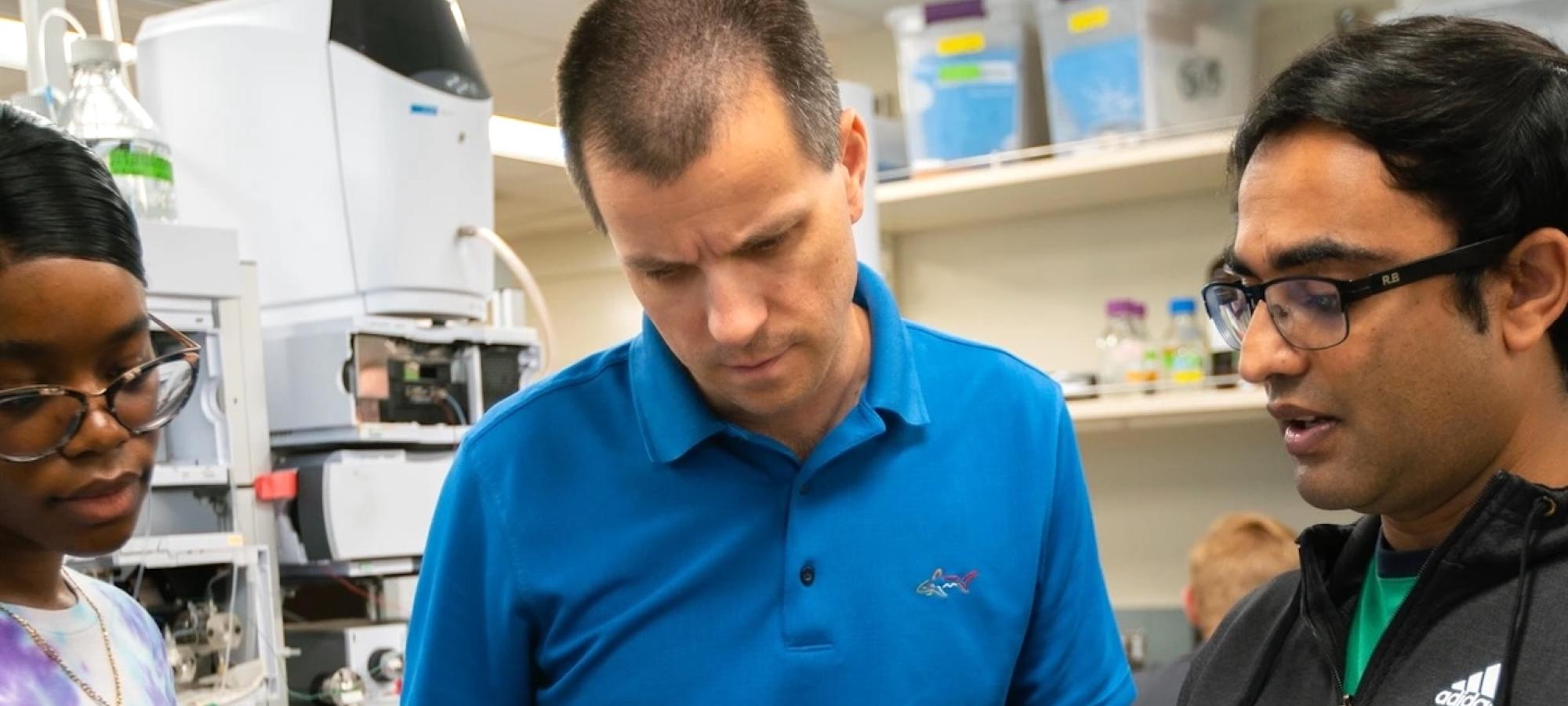 A Gustavus professor speaks to students about chemistry. 