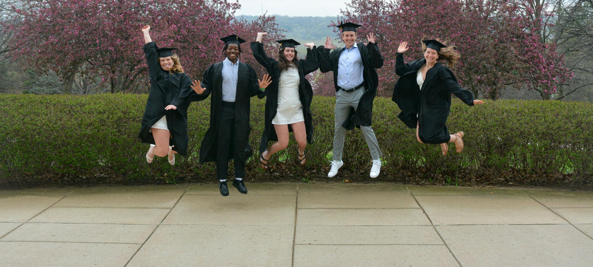 Students in gowns at Old Main