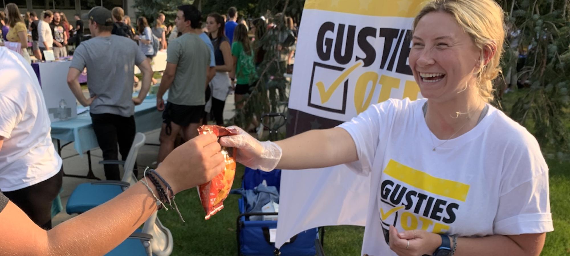 A woman works to get out the vote for Gustavus Adolphus College. 