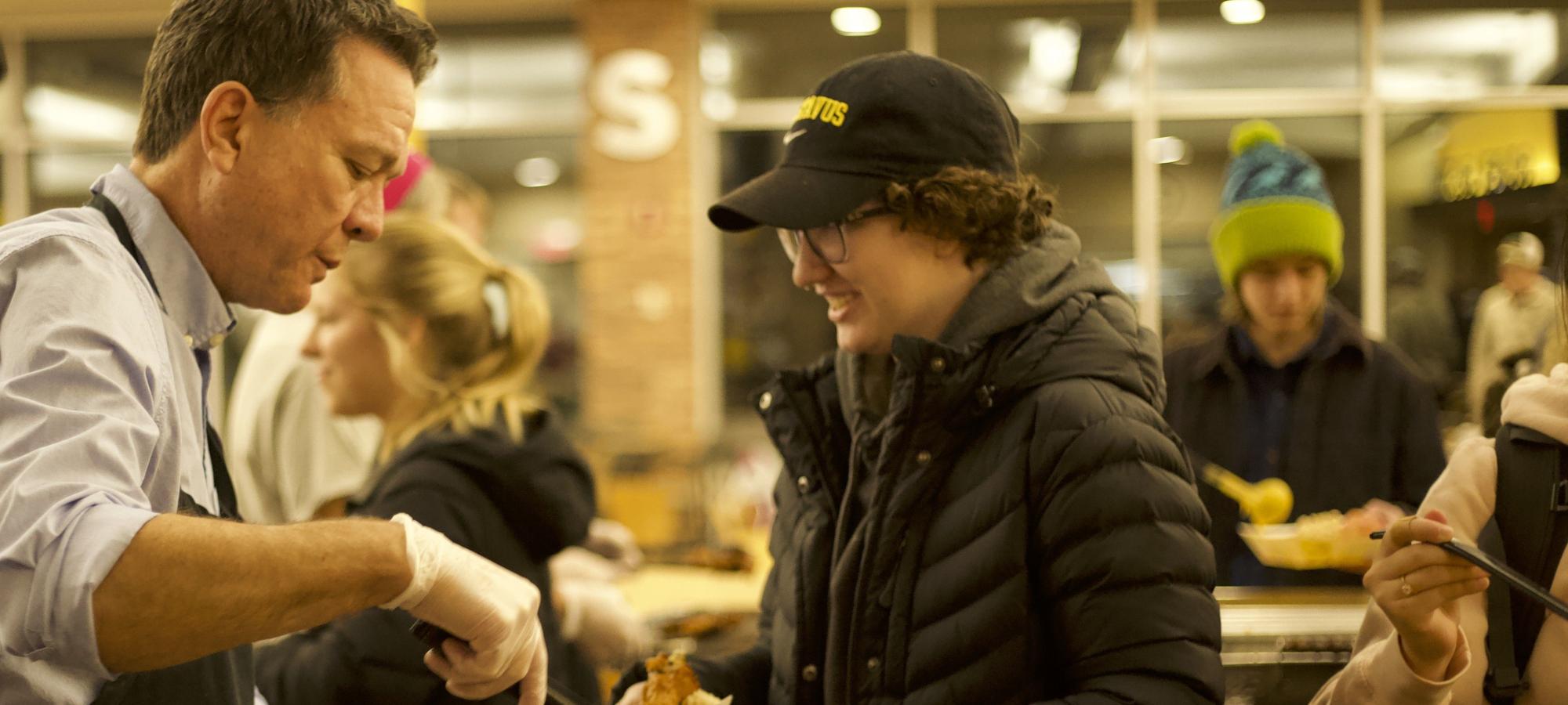 Serving wings at Midnight express