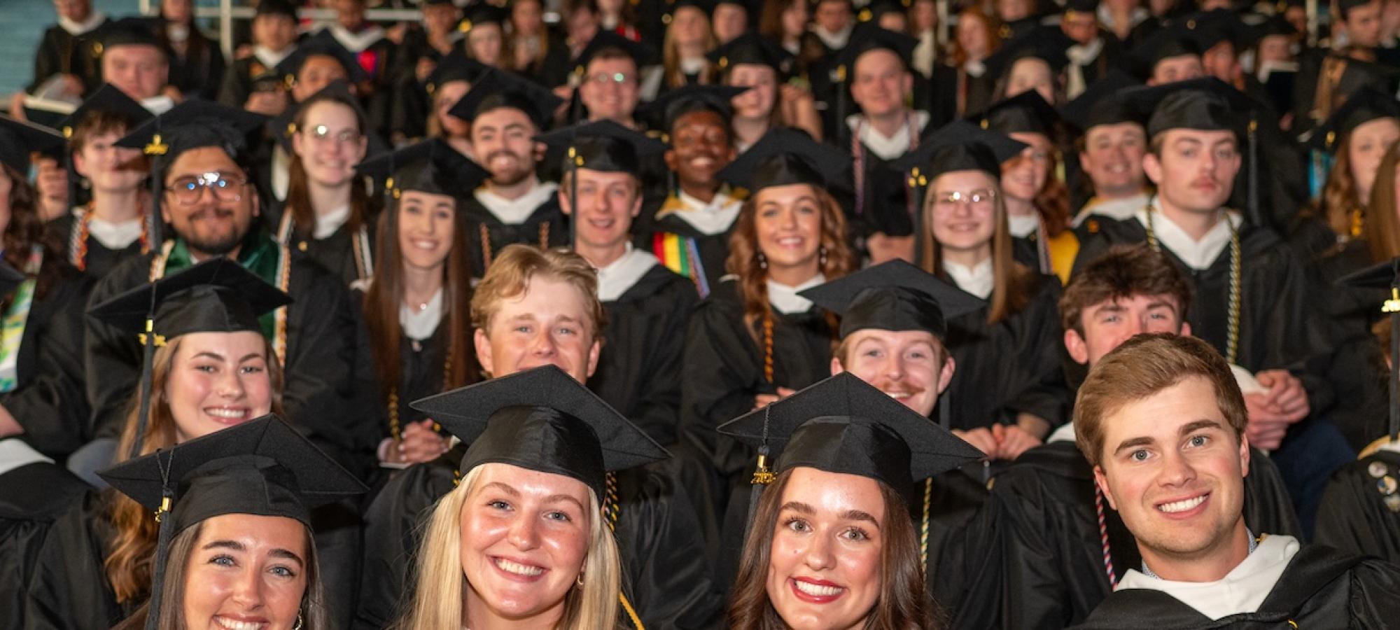 New Gustavus Adolphus College graduates at their Commencement. 
