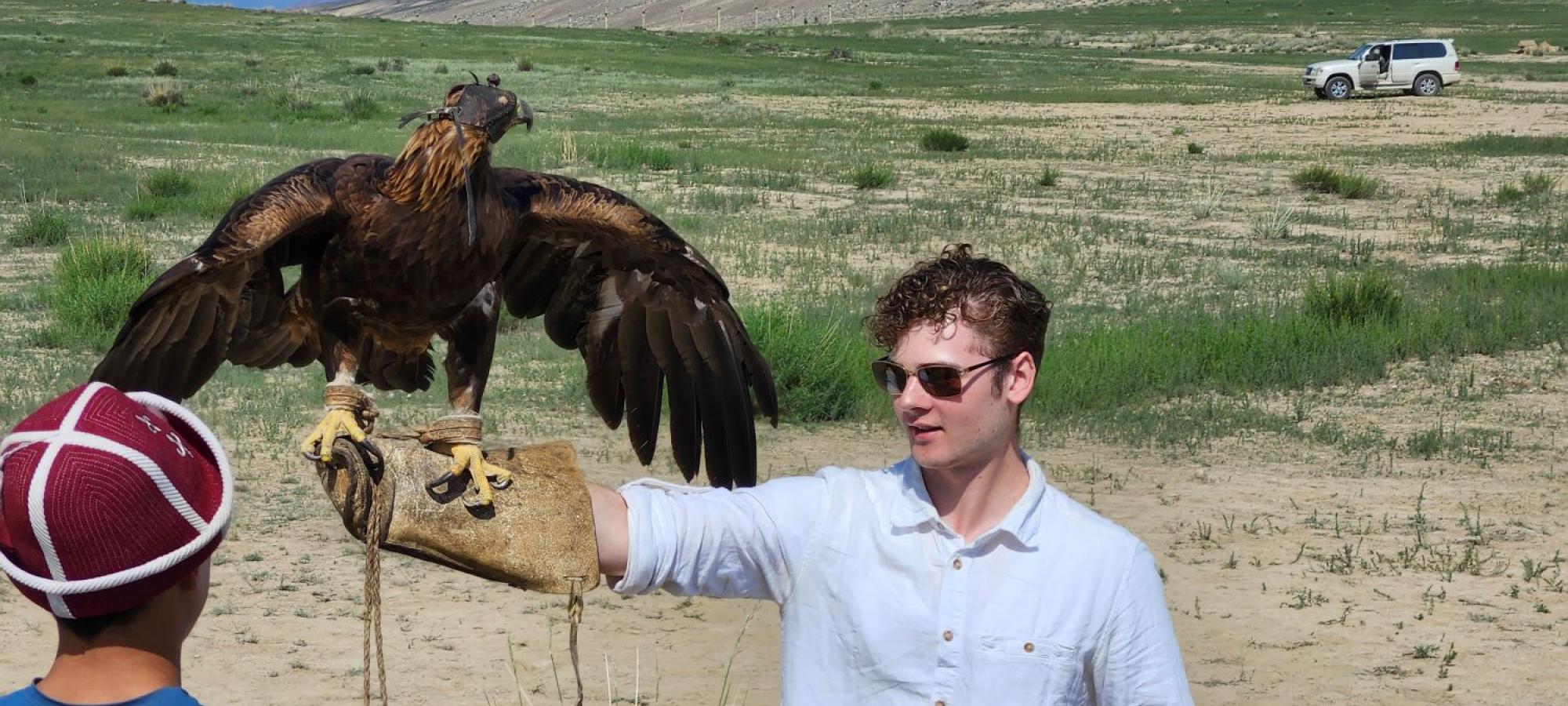 Fulbright student with hawk