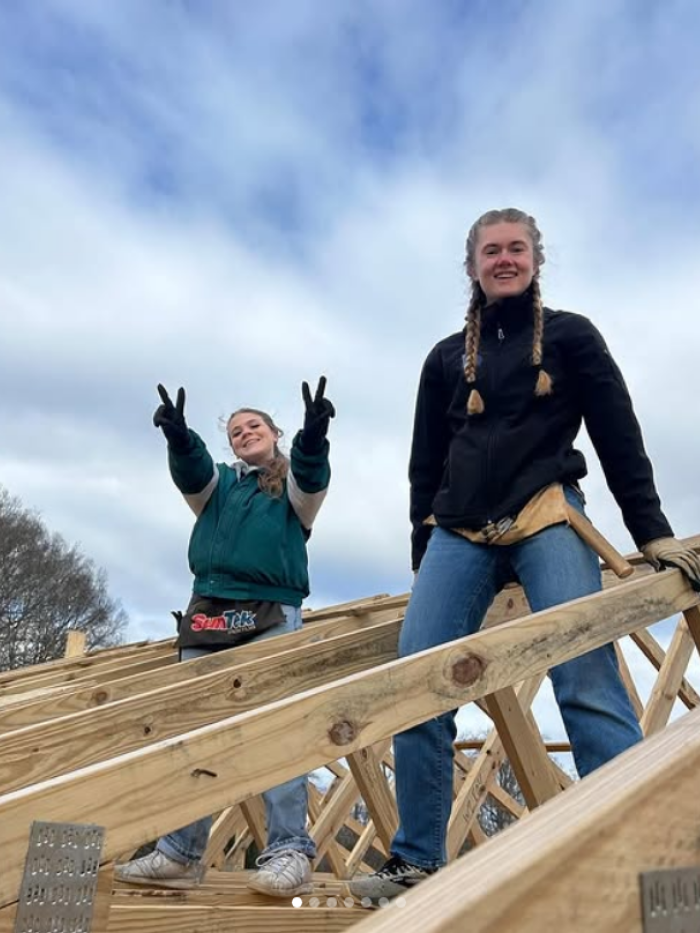 Habitat students building roof