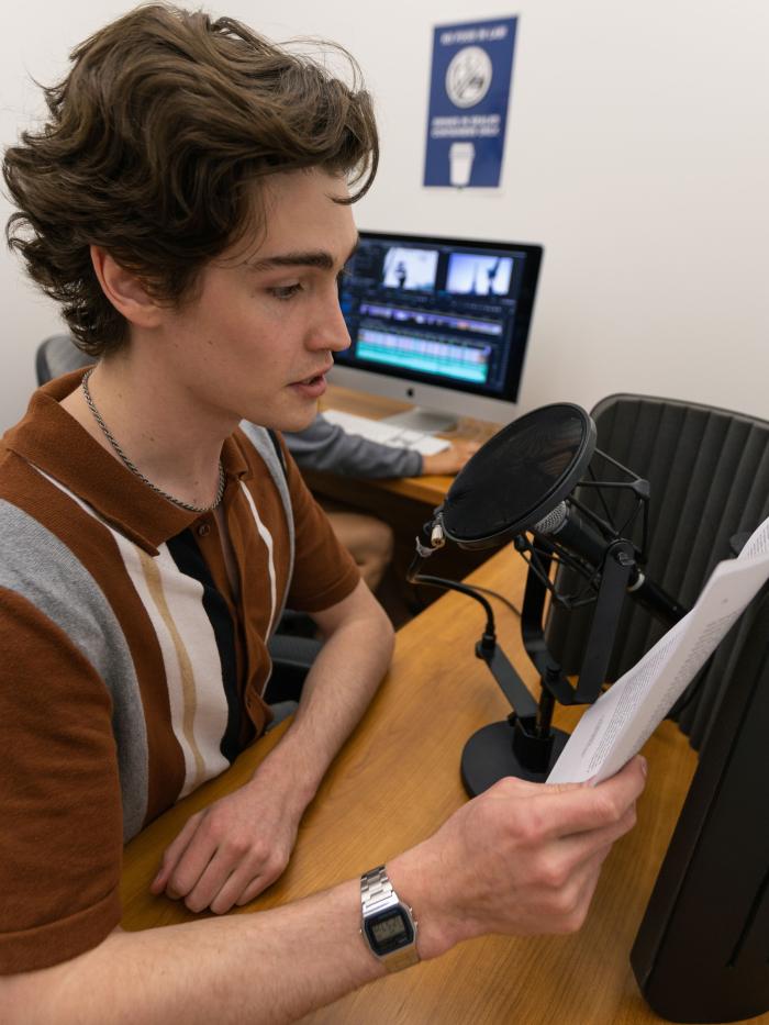 Student in podcast studio