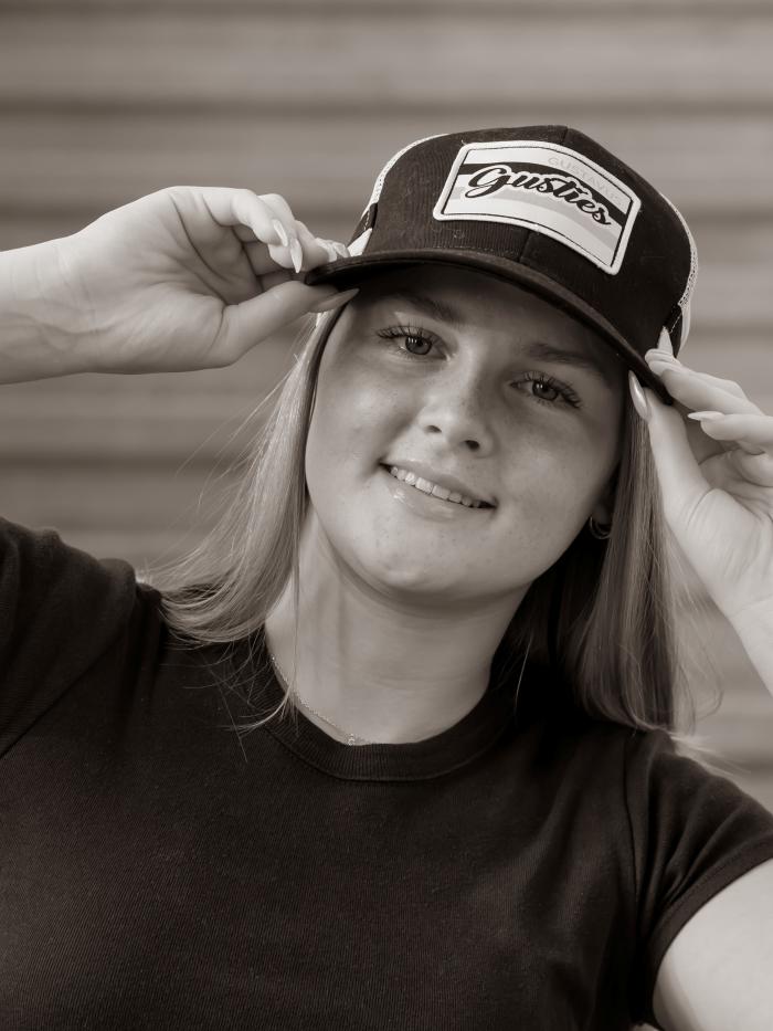 Student in baseball hat