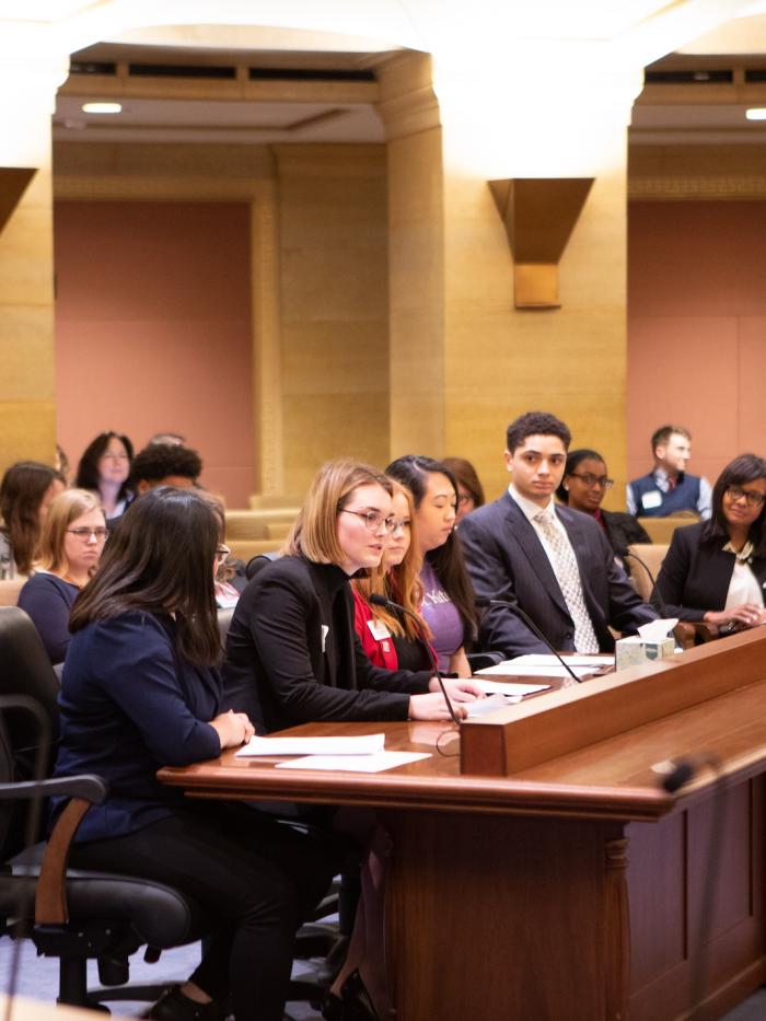 A student testifies at the Minnesota State Capitol