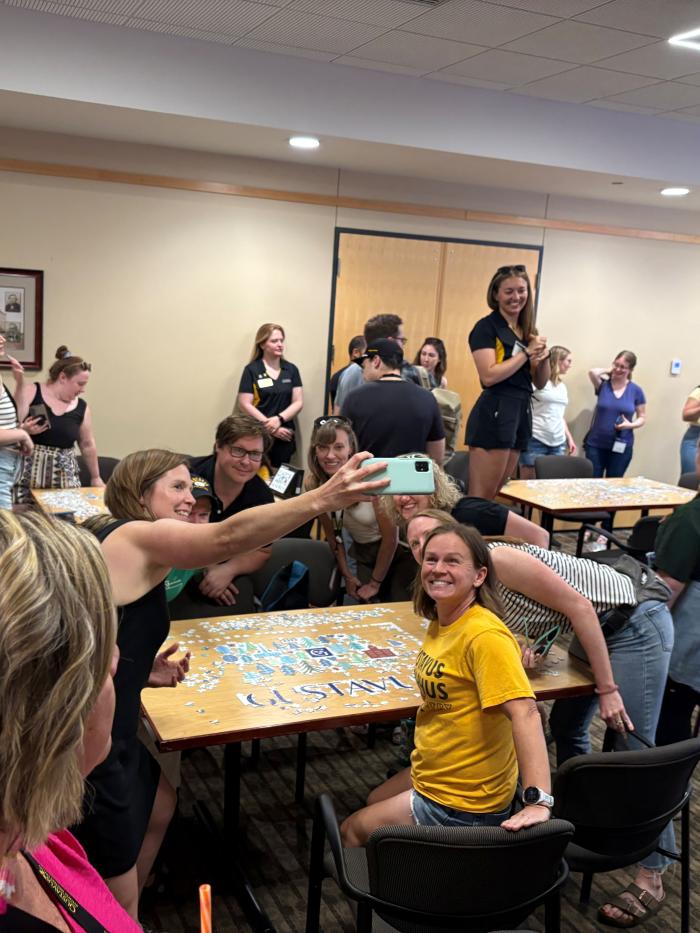 Reunion weekend alumni puzzle making