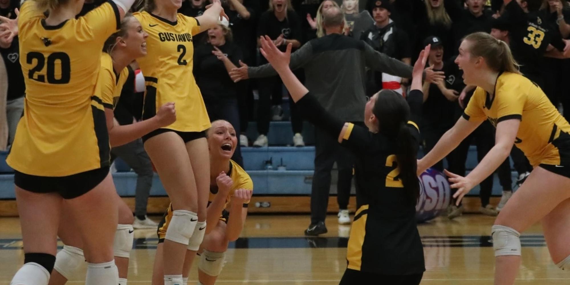 gustavus volleyball team celebrating